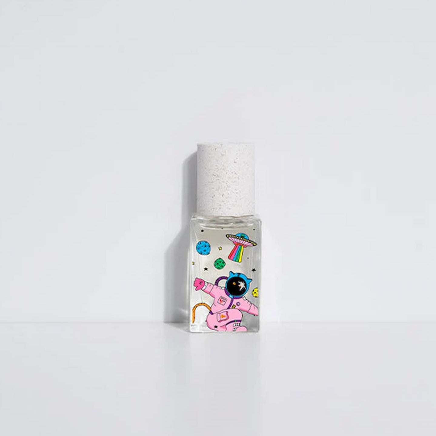 Small bottle with colorful design on a white background.