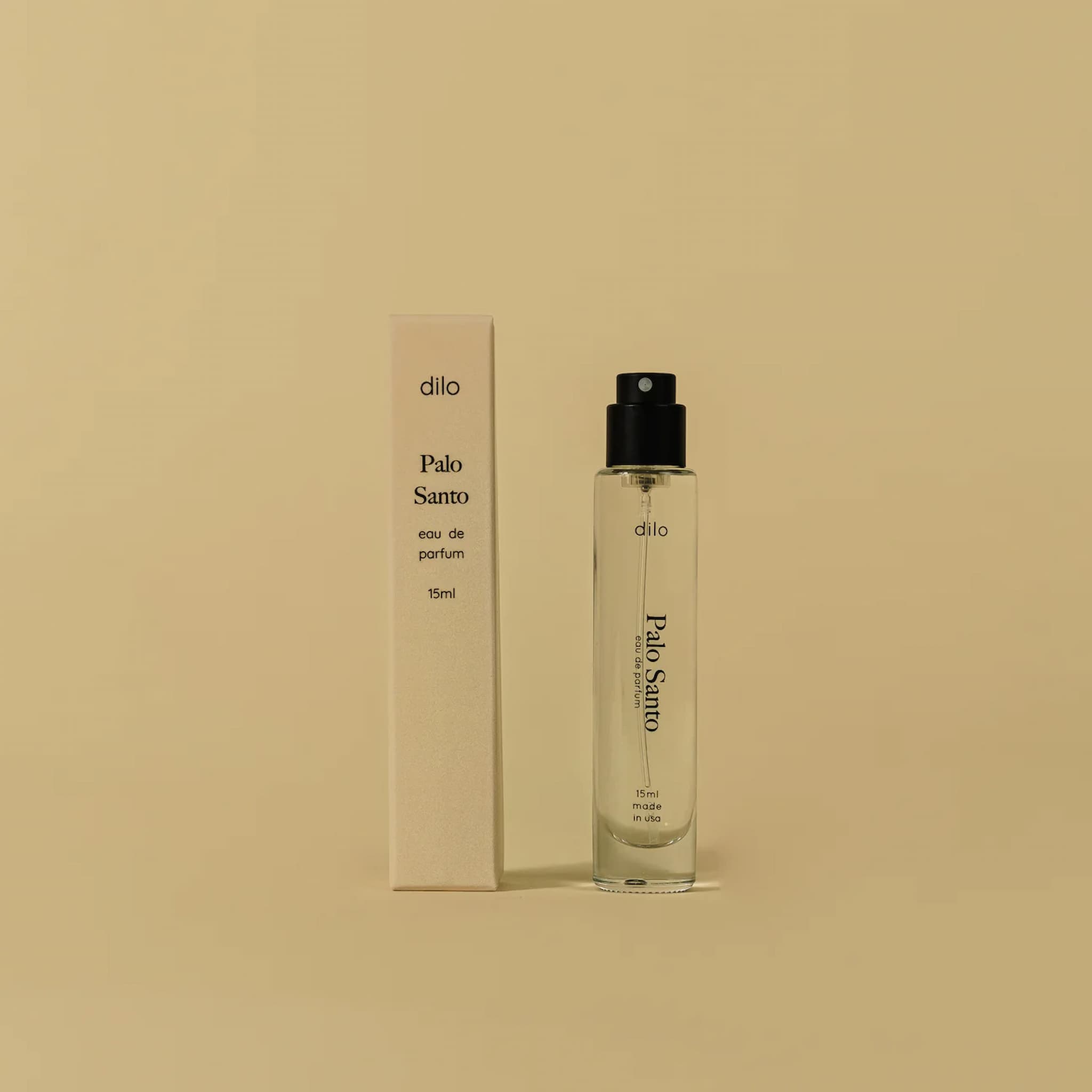 Perfume bottle and packaging of Dilo Palo Santo on a beige background
