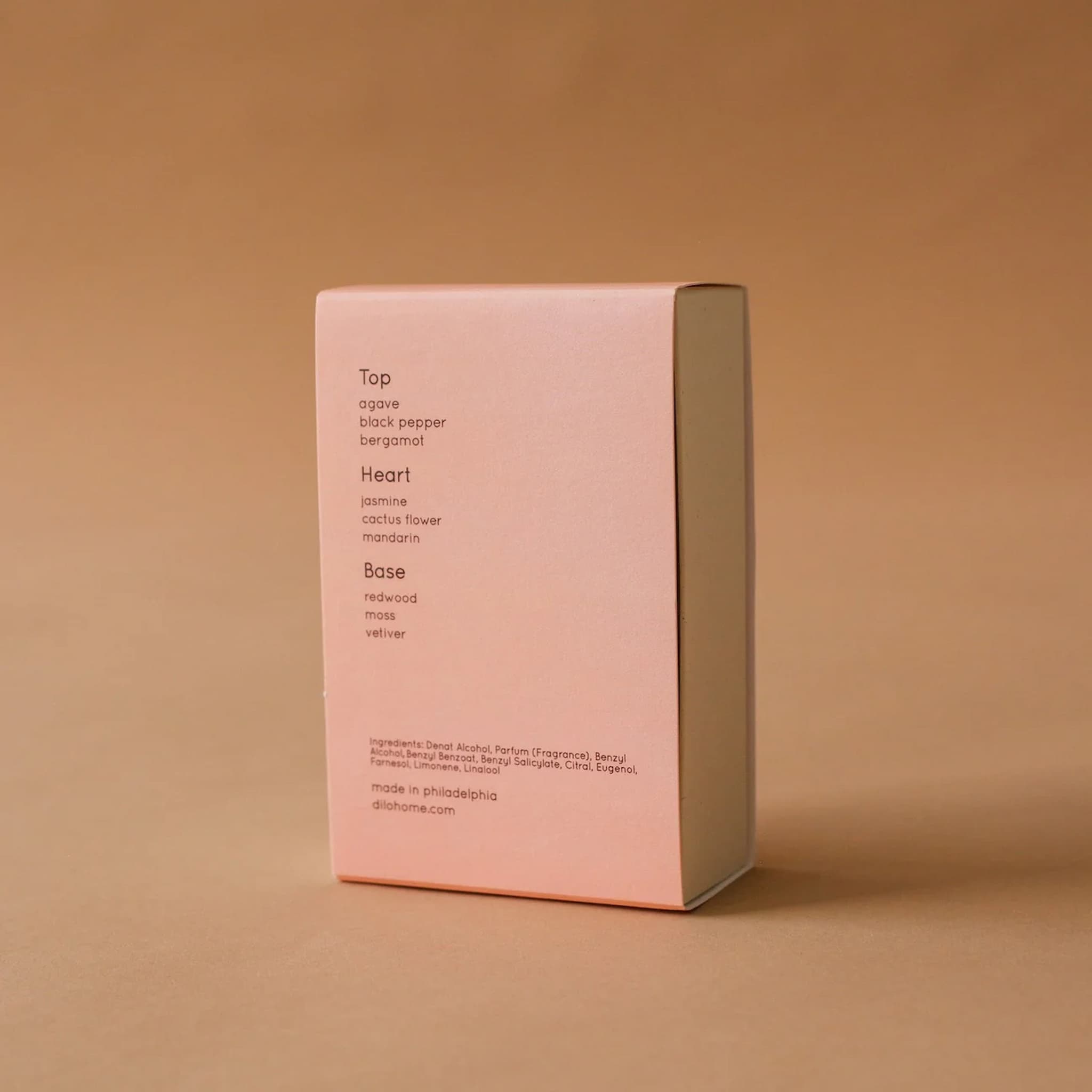 Pink box with text on a brown background