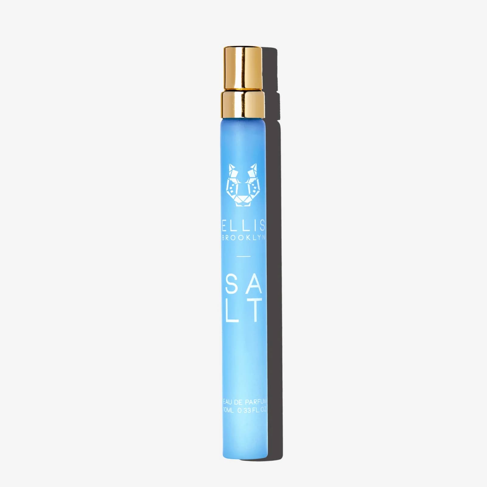 A light blue travel-sized bottle of Ellis Brooklyn Salt perfume on a white background.