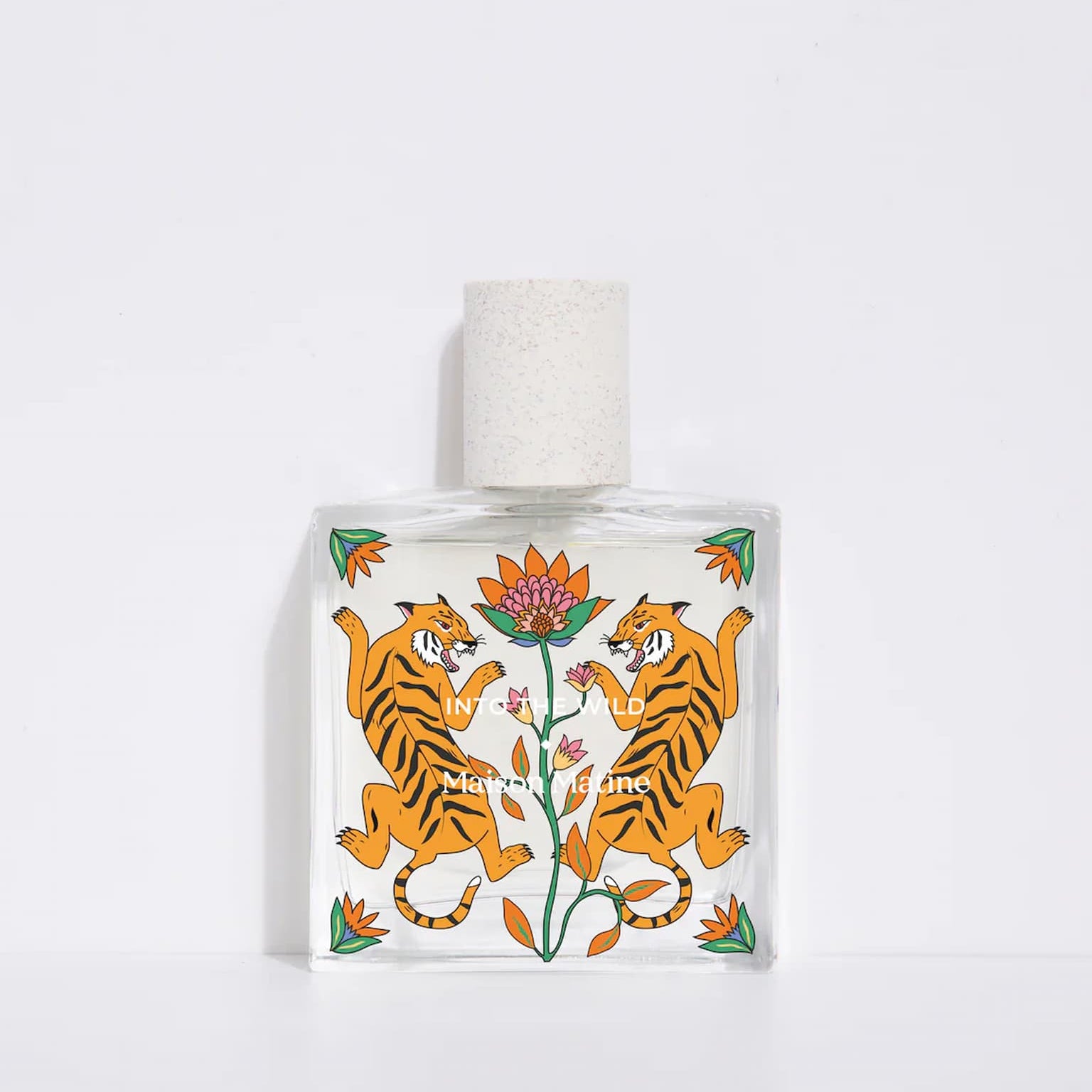 Maison Matine perfume with two tigers on the label on a white background.
