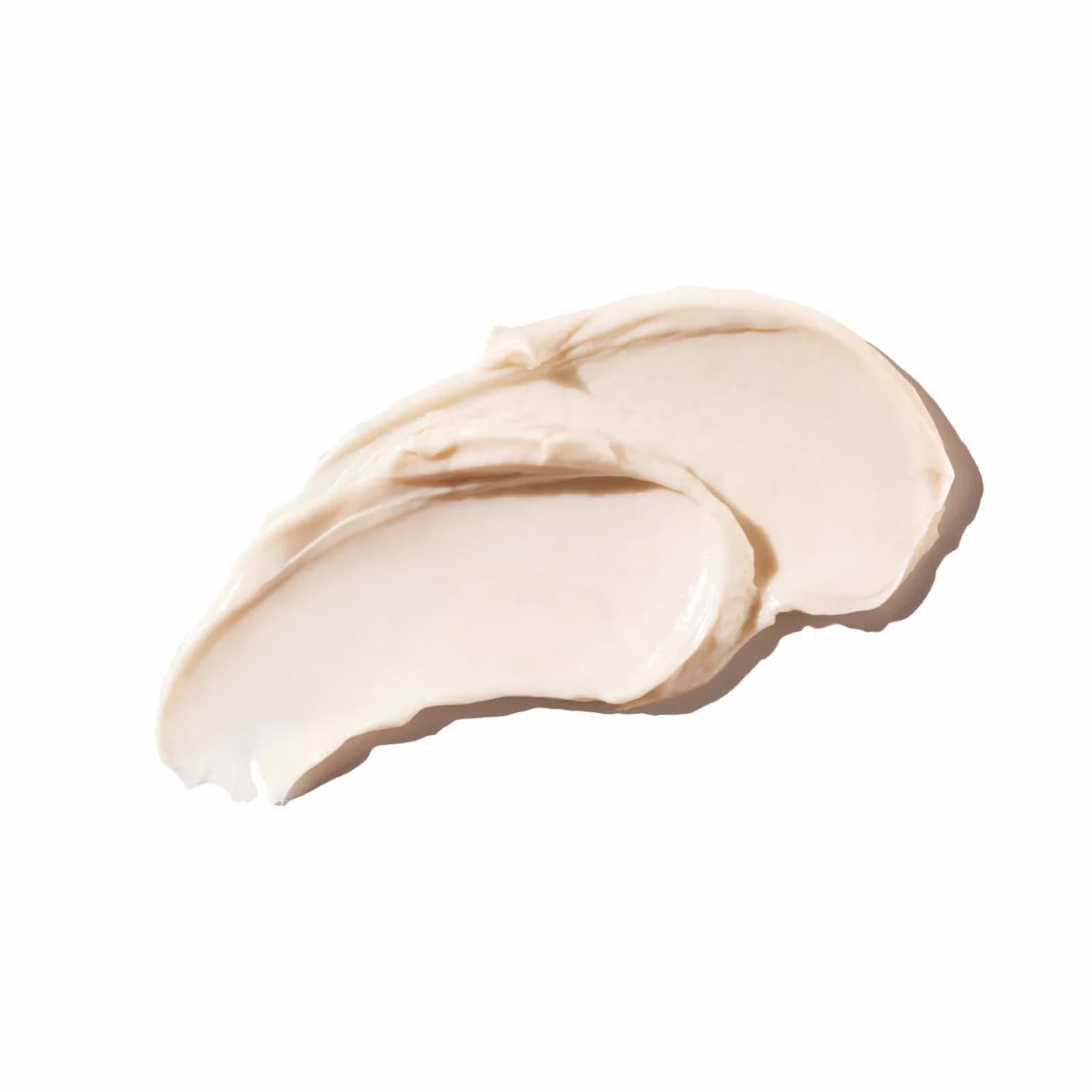 A thick, creamy swatch of Ursa Major Alpine Rich Cream, beige-cream color against a white background.