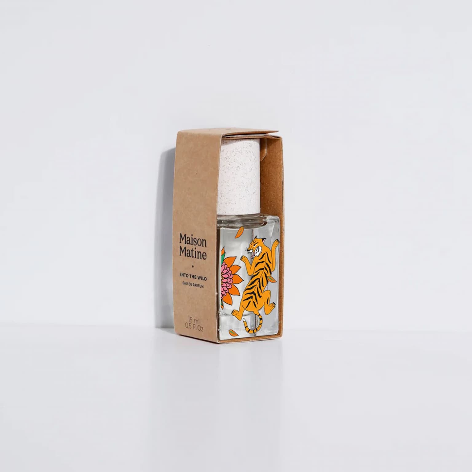 Bottle of Maison Matine fragrance with packaging on a white background