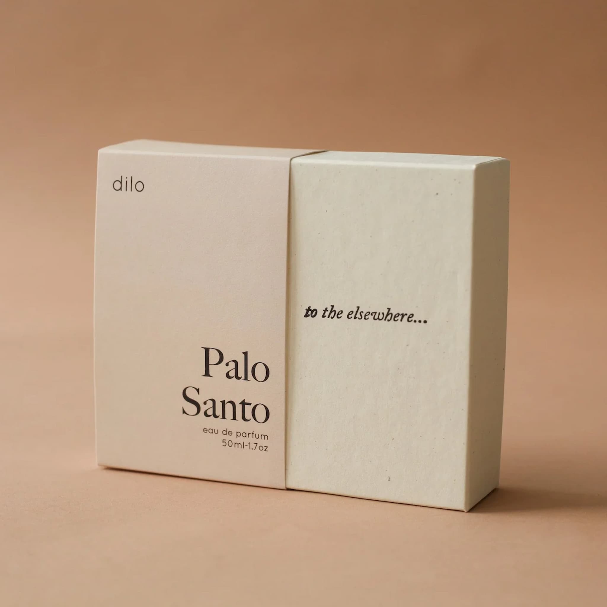 Dilo Palo Santo perfume packaging on a beige background