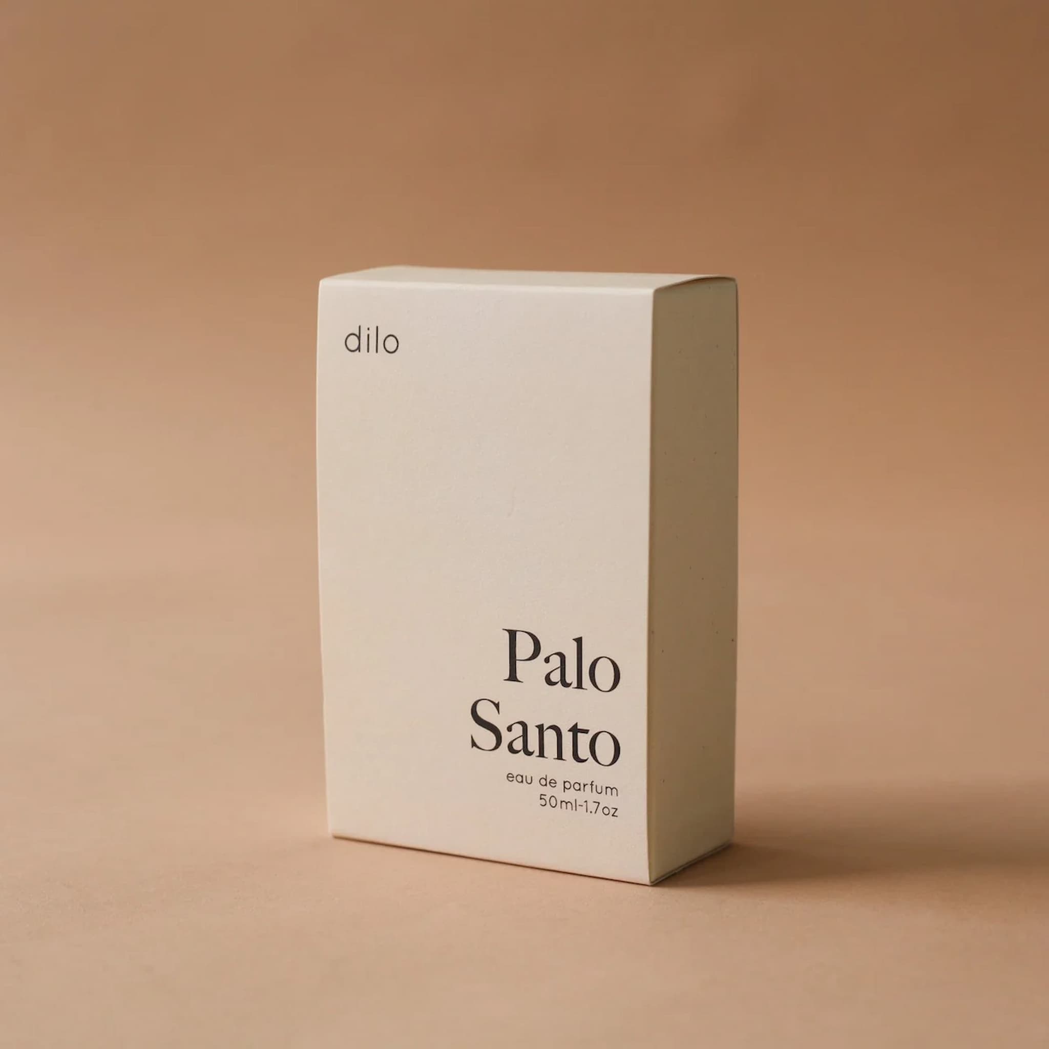 Beige box of Palo Santo perfume by dilo on a beige background