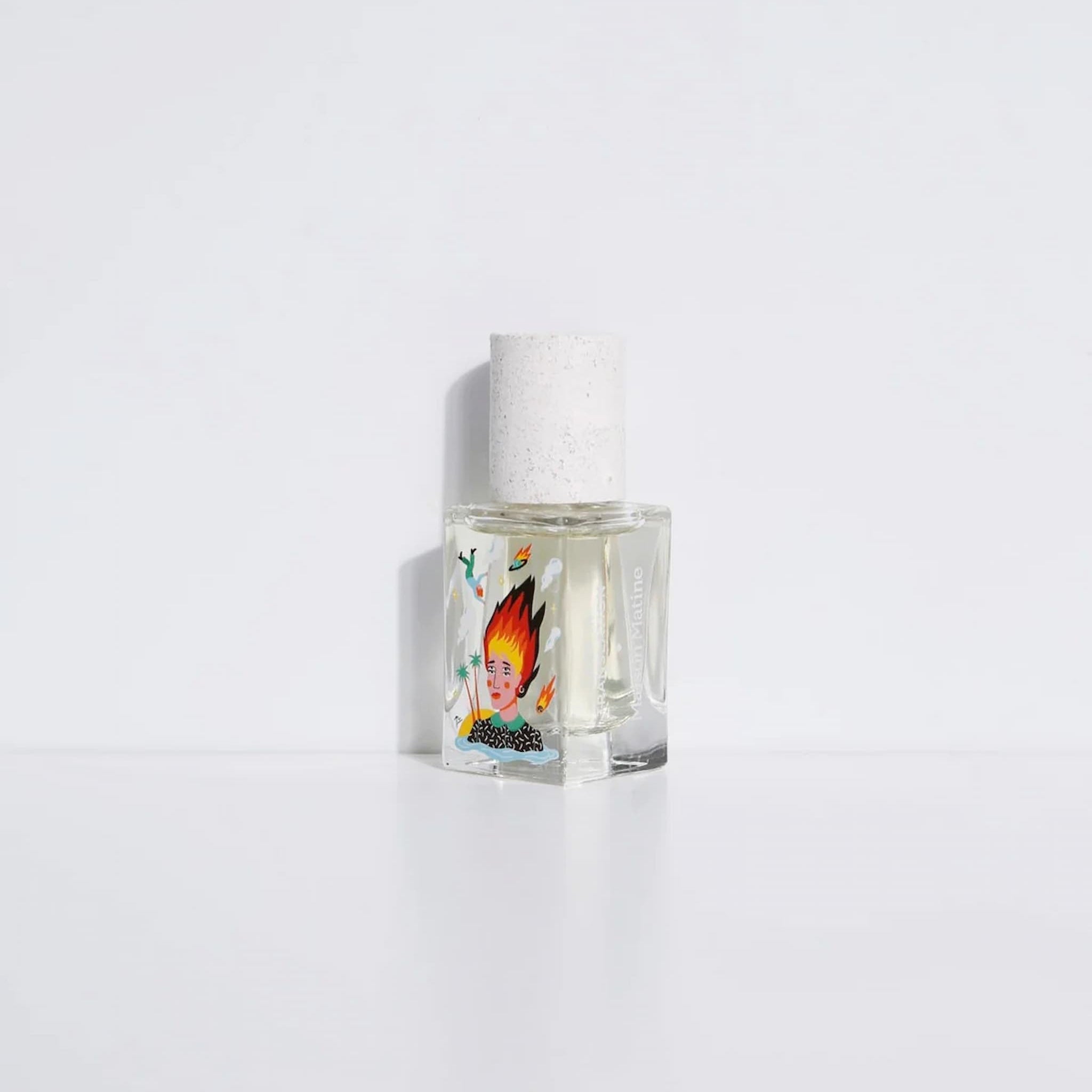 Clear glass bottle with a label featuring a colorful design on a white background