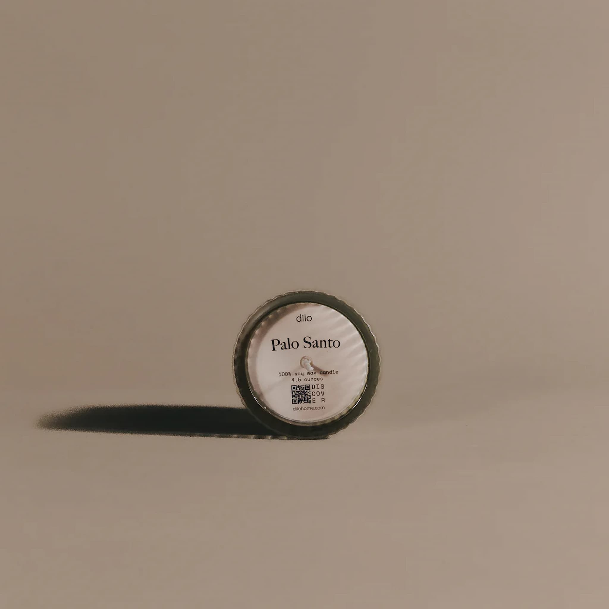 Palo Santo candle on a beige background
