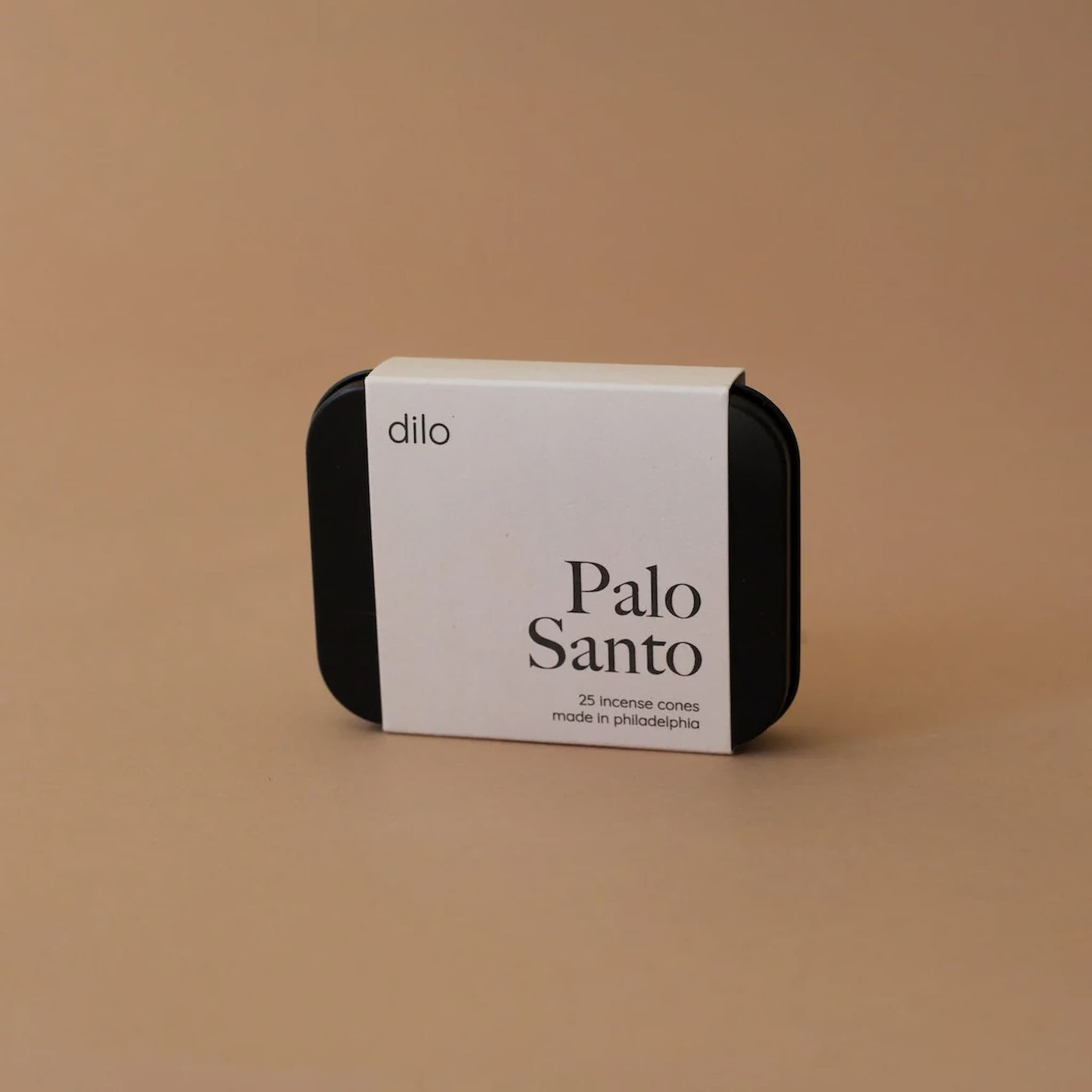 Palo Santo incense packaging with 'dilo' branding on a beige background