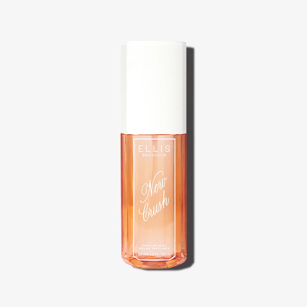 Ellis Brooklyn New Crush perfume mist bottle on an off-white background.