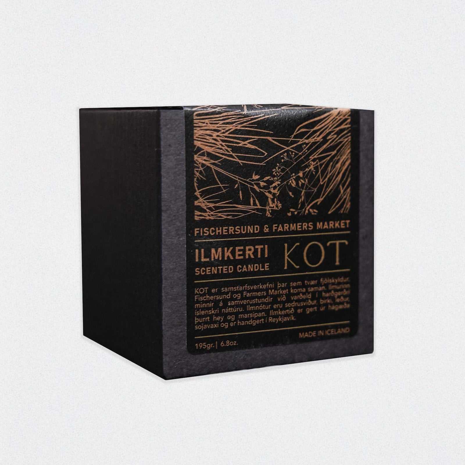 A black labeled box holding the KOT soy candle by Fischersund and Farmers Market, hand-poured in Reykjavík.