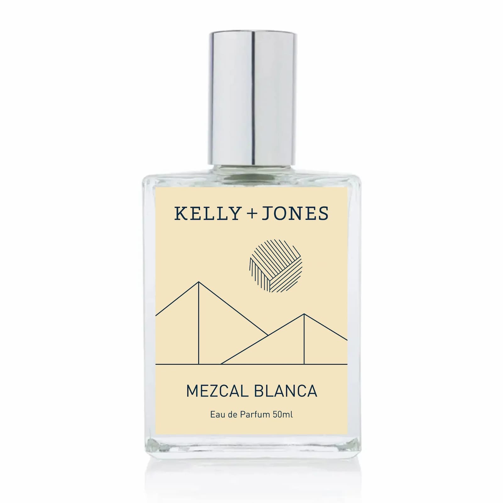 Kelly + Jones Mezcal Blanca Eau de Parfum 50ml bottle with a clear glass body, silver cap, and a pale yellow label featuring minimalist line art.