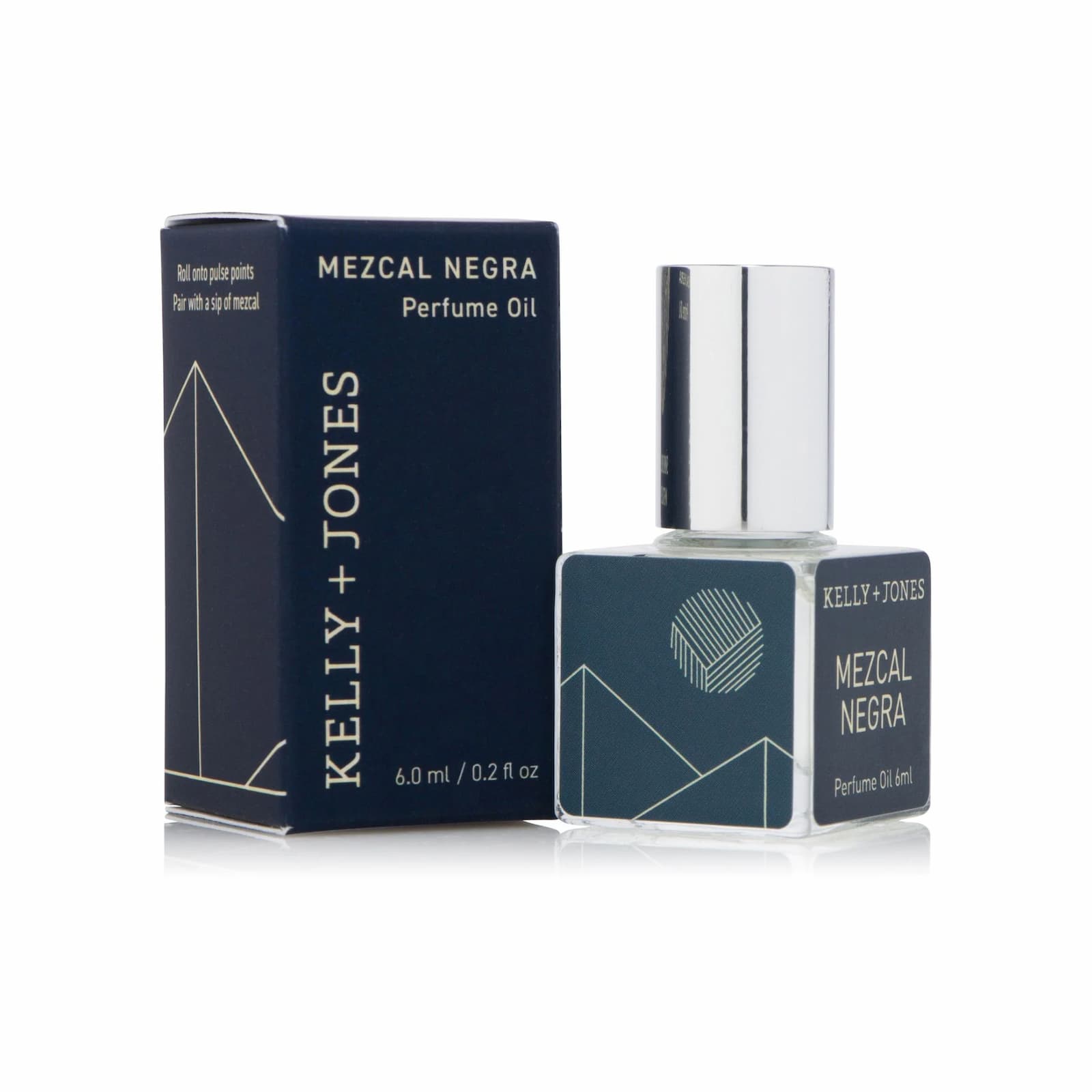 Kelly + Jones Mezcal Negra Perfume Oil bottle next to its box on a white background.