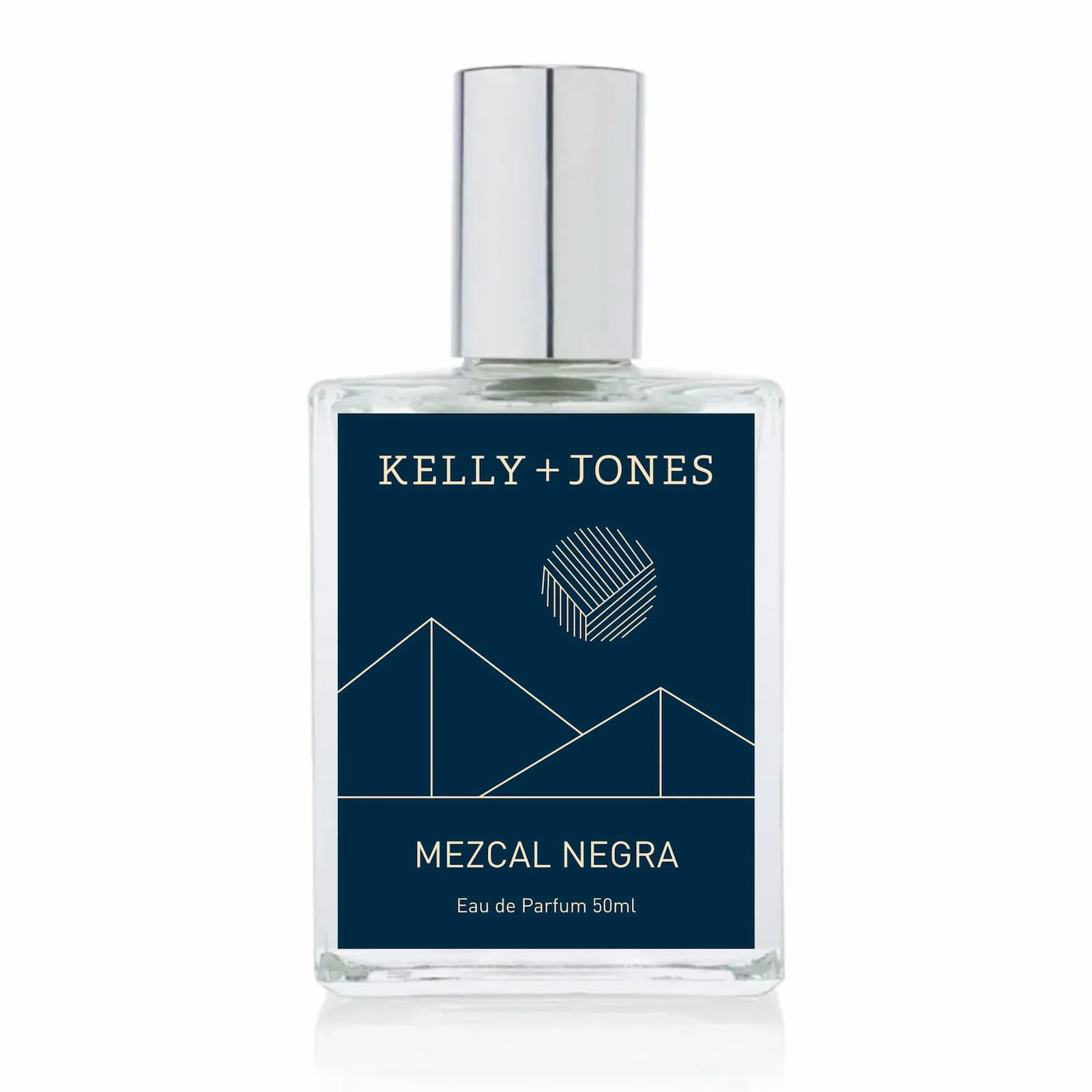 Kelly + Jones Mezcal Negra Eau de Parfum 50ml bottle with a silver cap and a dark blue label featuring white geometric mountain graphics.