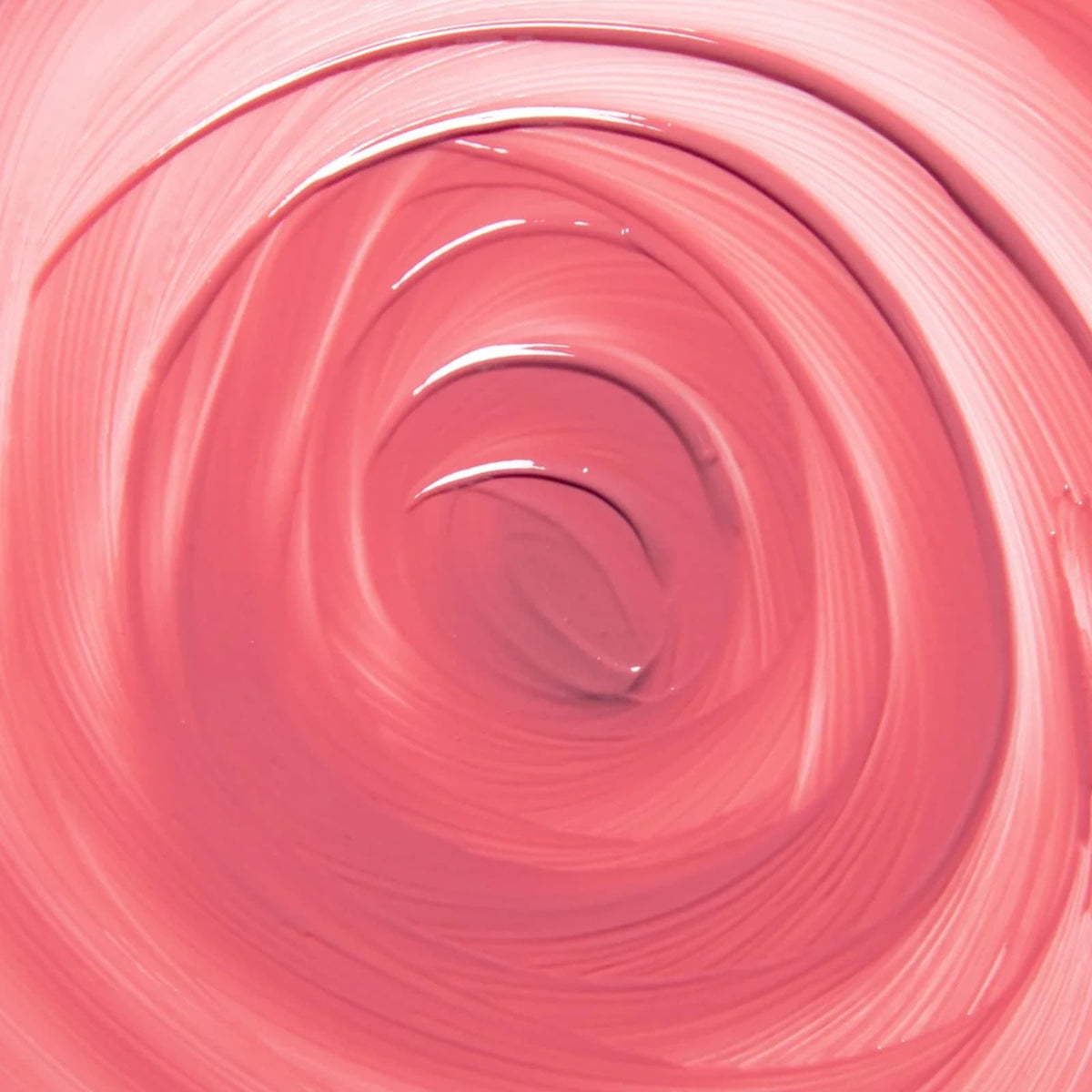 A pink swirl of Rituel de Fille Inner Glow Pigment Balm in "Bee Sting".