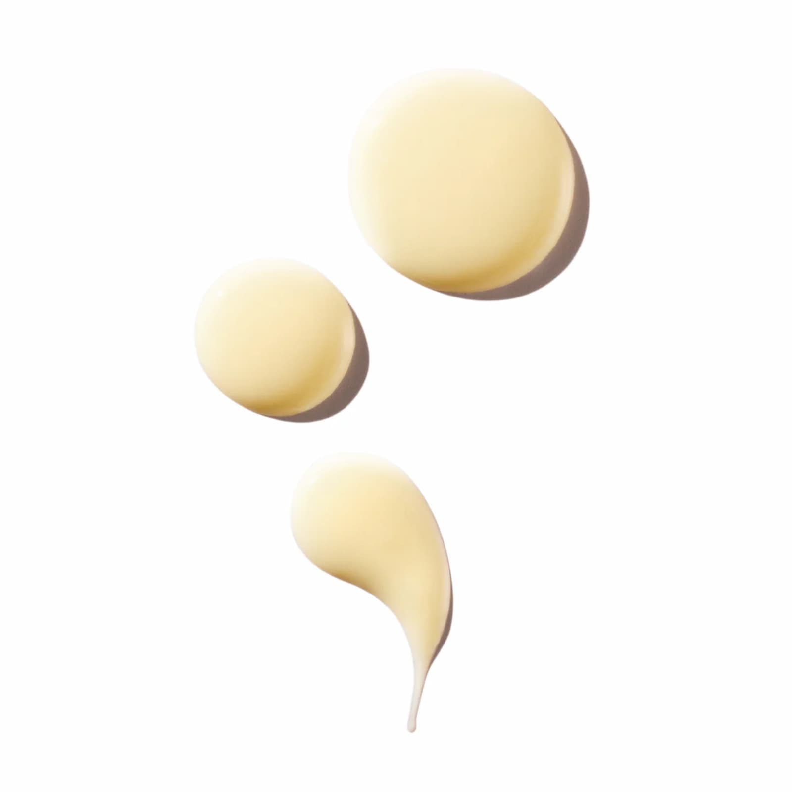 Three dots of Ursa Major Lunar Bloom Retinal Serum against a white background.